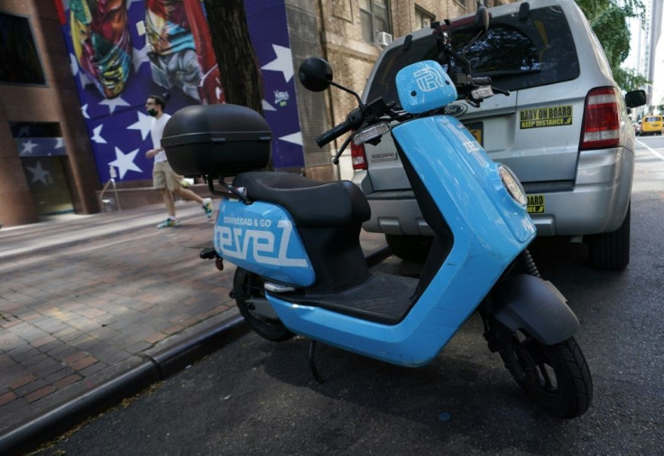 A Revel ridesharing moped is seen parked in midtown New York City July 28, 2020, after the company announced today it is suspending its service in New York City following the death of a second rider in Queens