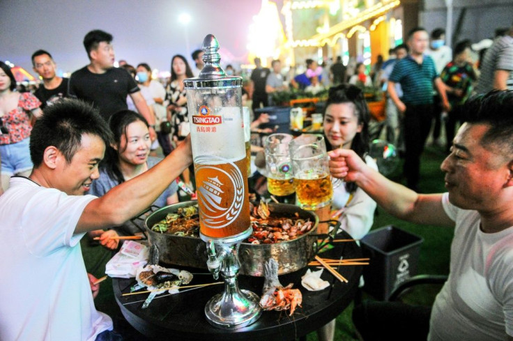 Beer-lovers were reassured by China's low numbers of new virus cases, and turned out to raise a glass
