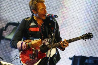 Rock band Coldplay has topped the album charts with their fifth studio album &quot;Mylo Xyloto&quot; 
