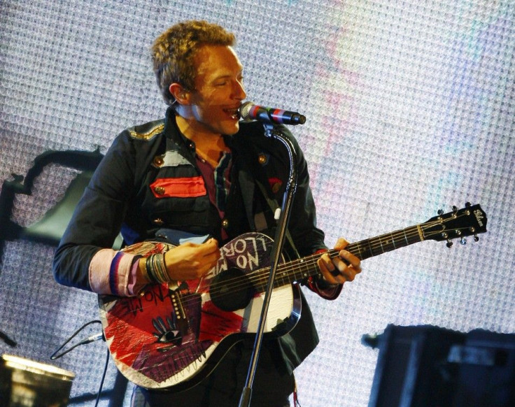 Rock band Coldplay has topped the album charts with their fifth studio album &quot;Mylo Xyloto&quot; 