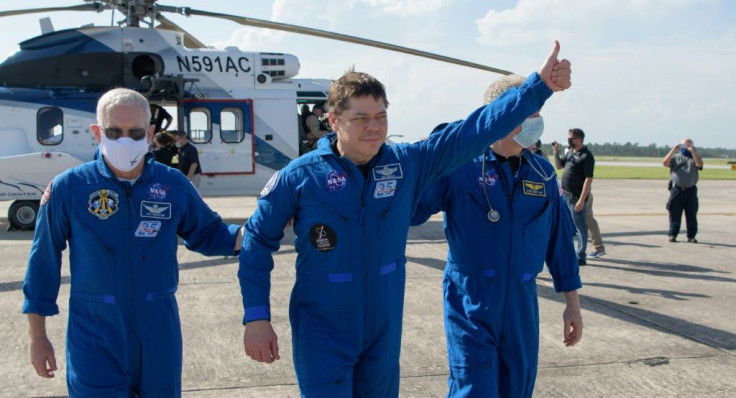 Bob Behnken (c) and crewmate Doug Hurley are best friends in real life and both are married to fellow astronauts