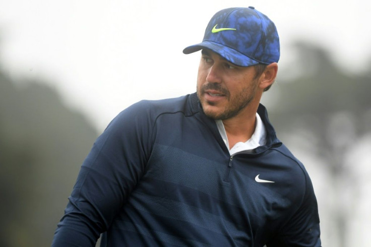 Two-time defending champ Brooks Koepka, of the US, looks on from the putting green during a practice round prior to the 2020 PGA Championship at TPC Harding Park