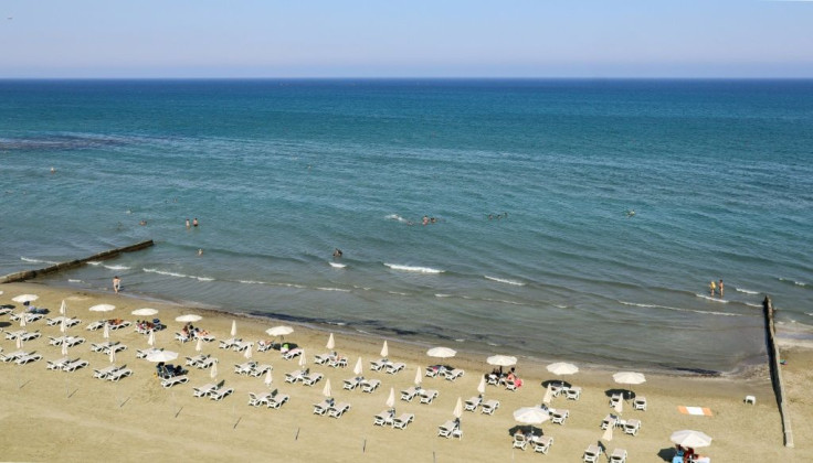 Cyprus' Makenzy beach, sparsely populated on the day the Mediterranean island re-opened to British tourists, the country's biggest source of arrivals