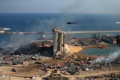 The damaged grain silos of Beirut's harbour and its surroundings one day after a powerful twin explosion tore through Lebanon's capital