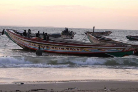 African migrants seeking to cross to the Canary Islands typically travel in small wooden boats like these. Smugglers' vessels are notoriously prone to engine failure and overloading.