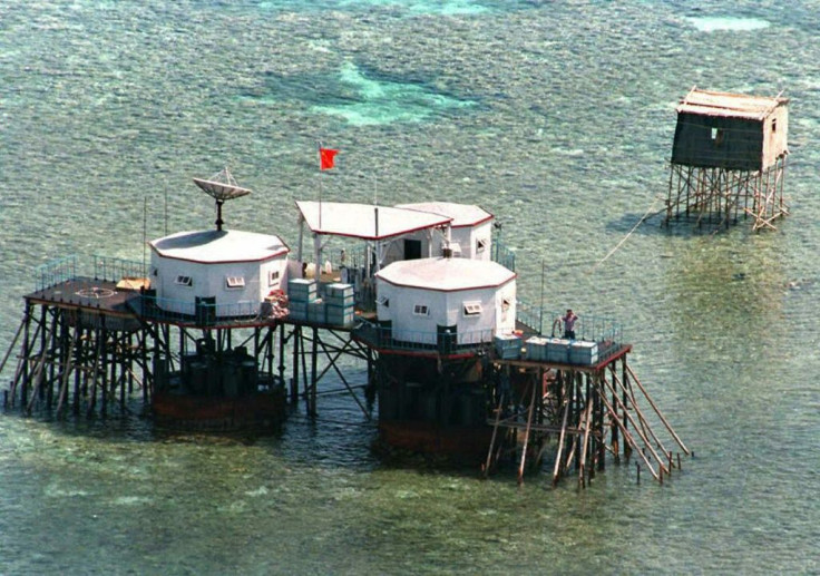 This file photo taken on April 1, 1995 shows China's flag flying over octagonal structures built on stilts at a reef claimed by the Philippines in the South China Sea, one of many sources of tension between China and the US