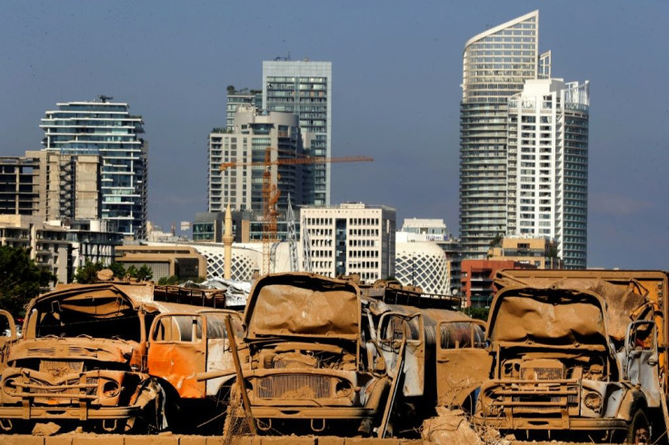 Destroyed trucks at Beirut port, three days after a massive blast devastated the Lebanese capital