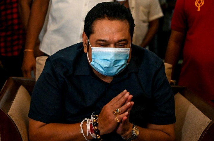 Sri Lanka's Prime Minister Mahinda Rajapaksa greeted supporters at his home