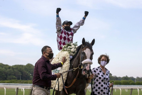 Jockey Manuel Franco rode Belmont Stakes winner Tiz the Law to victory on Saturday in the Travers Stakes, a tuneup race for next month's Kentucky Derby