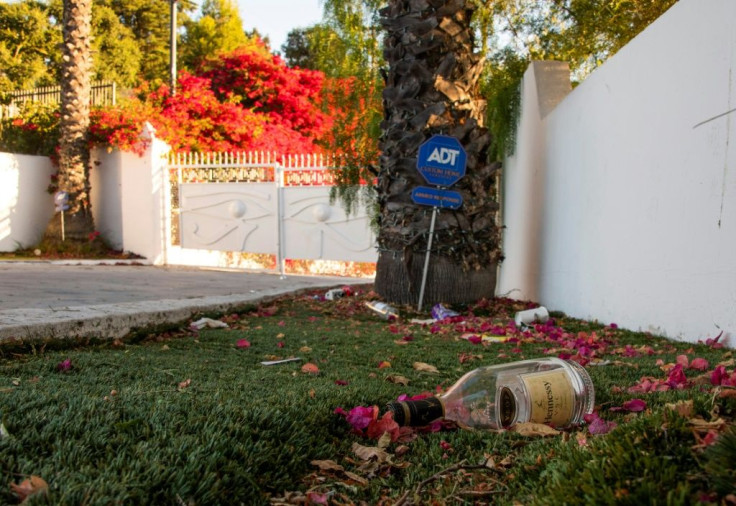 Beneath roaring TV news helicopters, police arrived at this mansion off Mulholland Drive packed with young partygoers