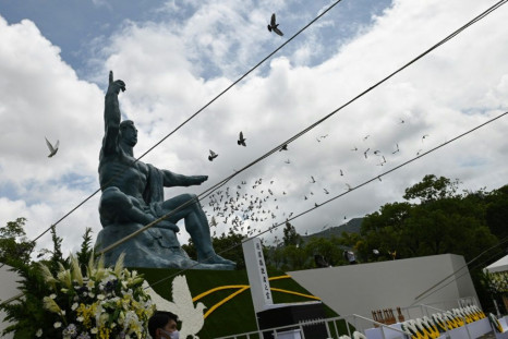 Doves fly during a ceremony marking the 75th anniversary of the atomic bombing of Nagasaki, at the city's Peace Park