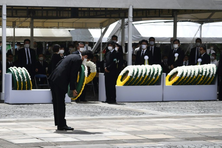 Japanese Prime Minister Shinzo Abe lays a wreath in Nagasaki on Sunday