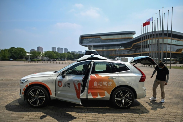 Chinese consumers -- known for eagerly embracing e-commerce, online payments and other digital solutions -- are lining up for a spin in DiDi Chuxing's self-developed autonomous taxis at a Shanghai pilot project launched in June
