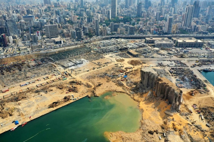 An aerial view of parts of the devastated Beirut port taken on August 7 shows the crater caused by the colossal explosion three days earlier of a huge pile of ammonium nitrate that had languished for years in a port warehouse