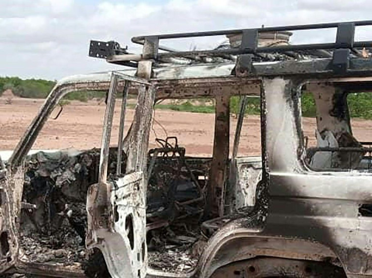 The burnt-out vehicle of eight people, including six French citizens, that was attacked by unidentified gunmen in southwest Niger
