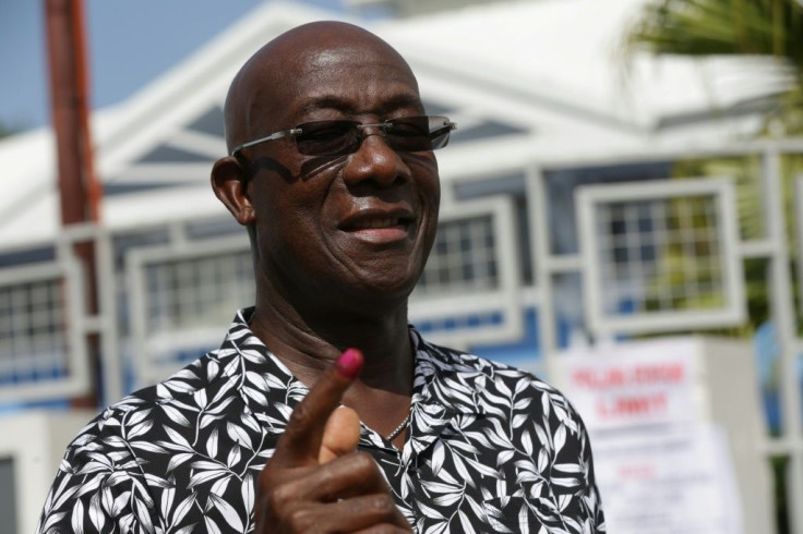 Trinidad and Tobago's Prime Minister Keith Rowley shows the indelible ink mark on his finger after casting his vote at a polling station west of Port-of-Spain on August 10, 2020