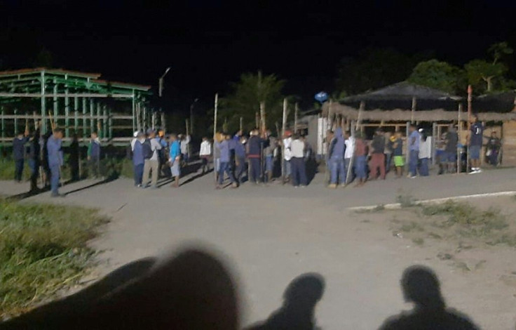Indigenous protesters gather at the Canadian-owned company called PetroTal oil companyâs settlement in the remote town of Requena, hours away by boat from the city of Iquitos, Peru, on August 9, 2020