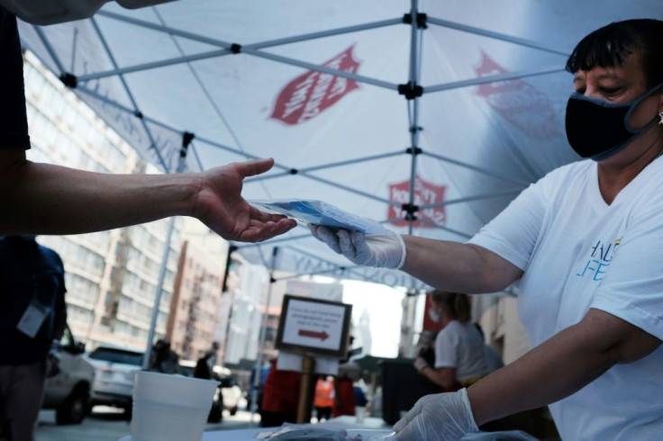 People receive free face masks at a Salvation Army Community Center in New York City