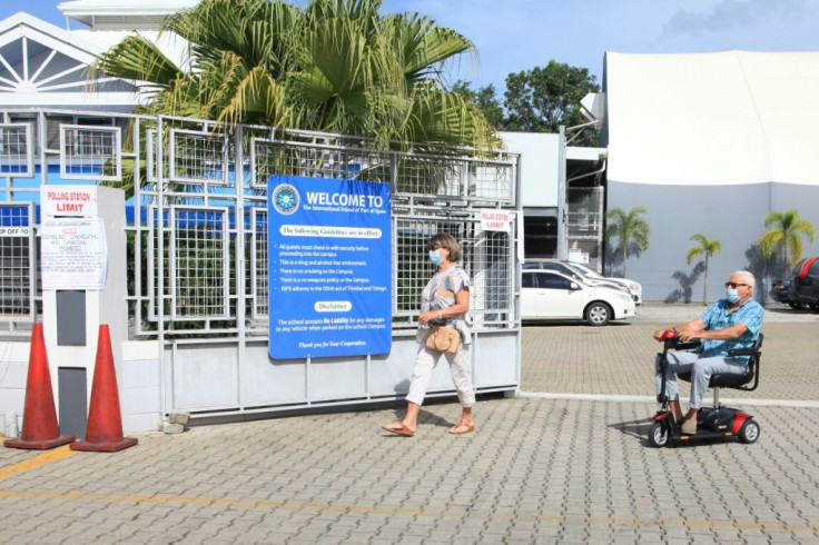 Masks were not required at polling stations but other anti-virus health measures were in place