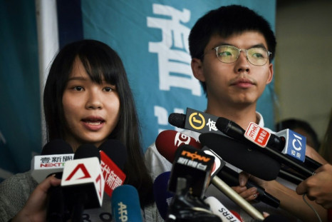 Agnes Chow (left) and Joshua Wong (right) are also being prosecuted for taking part in last year's huge pro-democracy protests