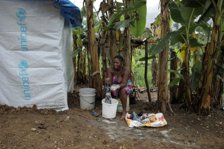 Migrants at the camp in La Penita, Panama have to cook, wash and do their washing in the open air due to a lack of facilities