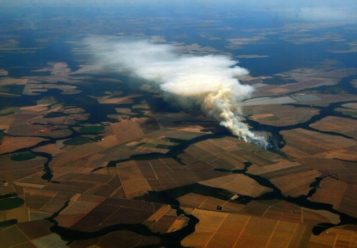 Brazilian agribusiness faces accusations of razing the Amazon -- here, a large fire burns in soybean fields near Lucas do Rio Verde, in Mato Grosso state