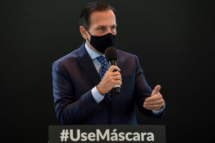 Sao Paulo Governor Joao Doria, pictured in July 2020, has tested positive for coronavirus but says he is "completely asymptomatic"