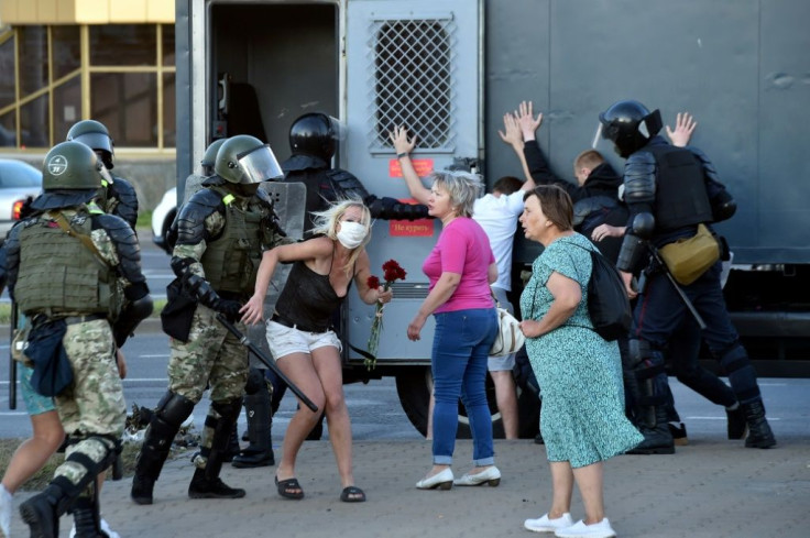 Belarus riot police forcibly detain protesters demonstrating against widely criticised election results