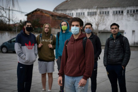 Uruguayan Felipe Paz (front) poses with friends before playing football in Montevideo on August 6, 2020, amid the new coronavirus pandemic