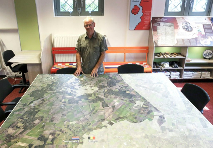 Willem van Gool, chairman of the tourism office for Baarle-Hertog and Baarle-Nassau, poses in Baarle, Belgium.