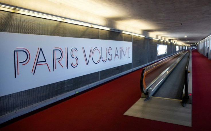 A sign reading "Paris loves you" adorns one arrivals hall in the French capital's Charles de Gaulle airport