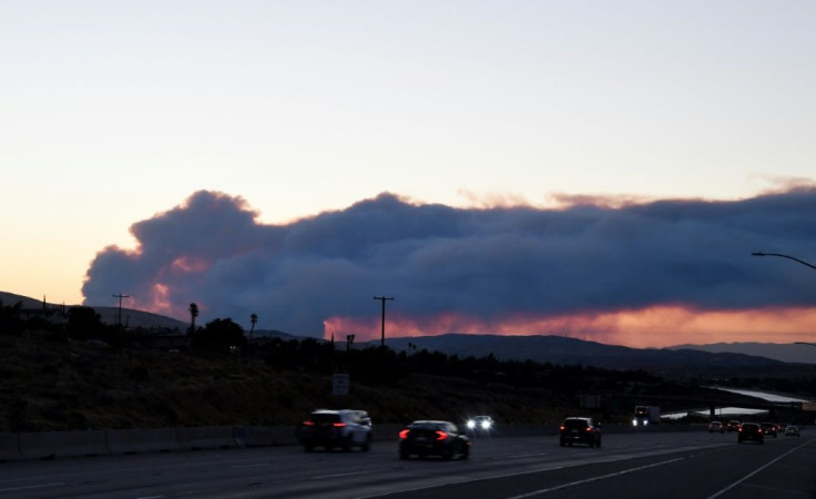 A fast-moving brush fire north of Los Angeles has prompted mandatory evacuation orders for some 500 homes