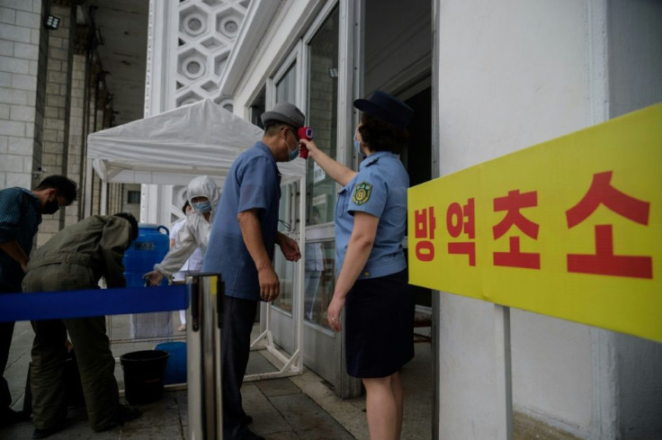 Passengers underwent temperature checks on arrival at the station
