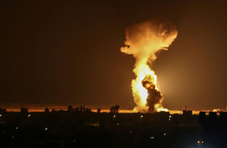 Smoke and flames rise after Israeli war planes carried out airstrikes on the southern Gaza Strip city of Rafah on August 12