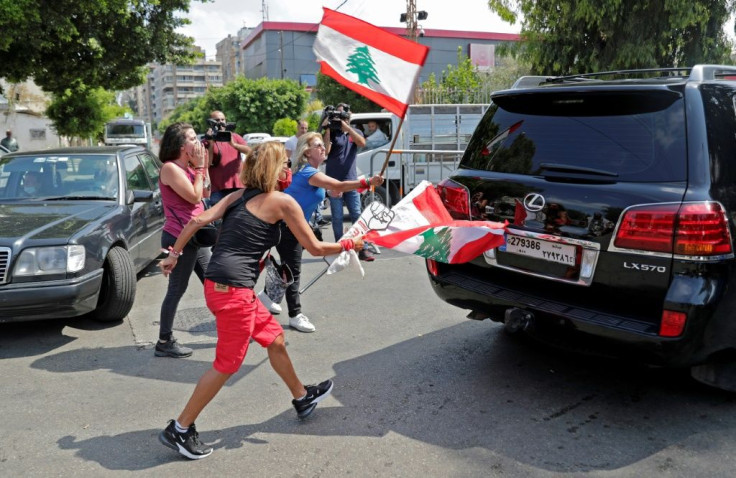 Lebanese protesters make an abortive attempt to disupt a session of parliament at which it backed the emergency powers assumed by the government