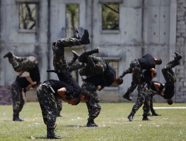 People&#039;s Liberation Army soldiers demonstrate martial arts during an open day of their barracks in Hong Kong