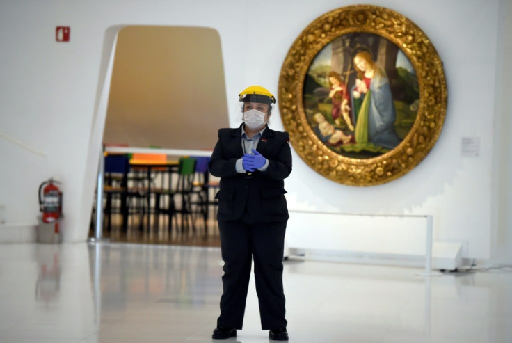 Security guards at Mexico City's Soumaya Museum are wearing face masks and shields for extra protection
