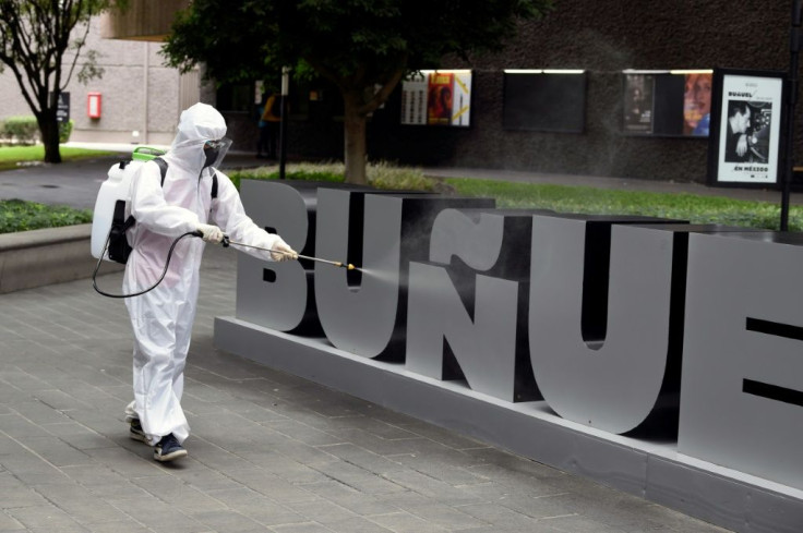 A worker sanitizes an area of the Cineteca Nacional in Mexico City