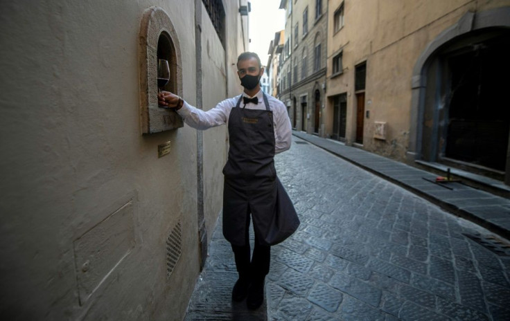 The "buchette del vino", or wine windows, are enjoying a renaissance in the COVID-19 pandemic as they offer bars a chance to attract customers while social distancing