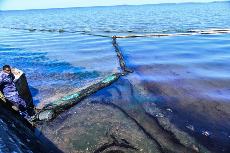 Images have showed huge stretches of crystal-clear seas around the marooned cargo ship stained an inky black