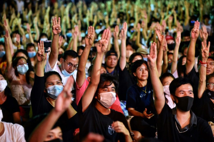 The three-fingered salute from The Hunger Games films is commonly seen at the protests