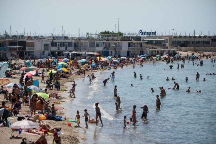 Pictures of packed beaches have sparked outrage over the summer, but is it offices that are the greater risk?