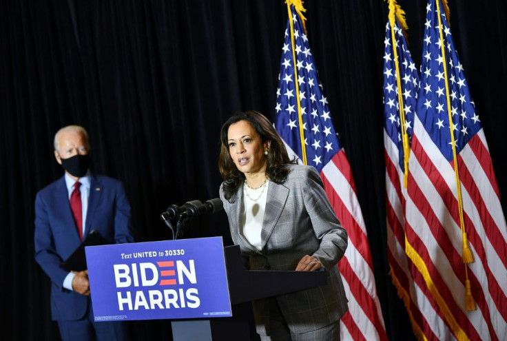 Democratic presidential nominee Joe Biden (L) with vice-presidential running mate Senator Kamala Harris, whose mother hailed from India and whose father was born in Jamaica