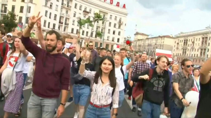 Belarusians in Independence Square in Minsk rally against violence where  police have used rubber bullets, stun grenades and, in at least one case, live rounds to disperse rallies accusing Alexander Lukashenko of fraudulently winning re-election