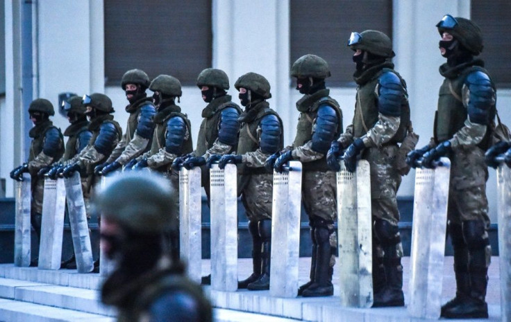 Belarusian law enforcement officers guarded government buildings during the protest rallies