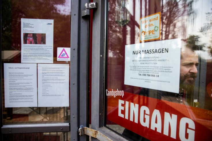 A note at the Candy Store brothel entrance warns clients "only massages" are on offer