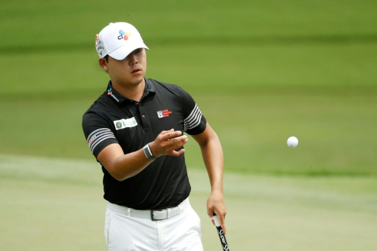 South Korea's Kim Si-woo aced one hole and nearly added another on his way to an eight-under par 62 on Saturday to grab a two-shot lead at the PGA Wyndham Championship