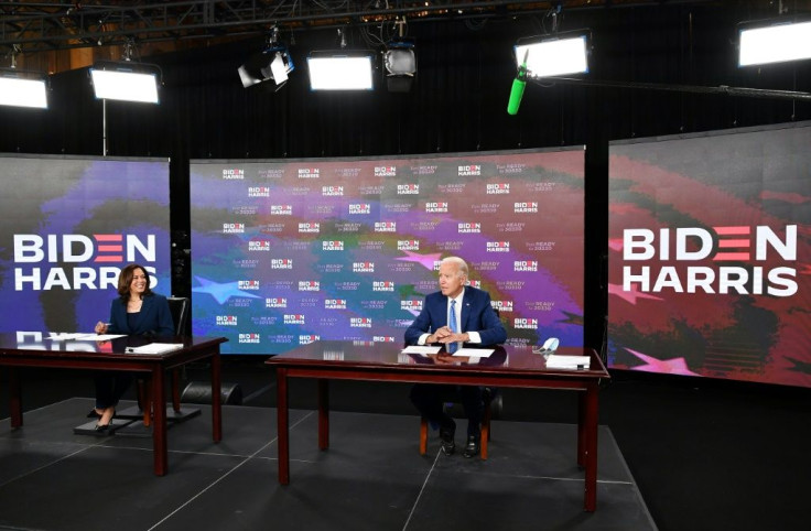 Joe Biden and running mate Kamala Harris sign required documents for receiving the Democratic nomination for President and Vice President, in Wilmington, Delaware, on August 14, 2020