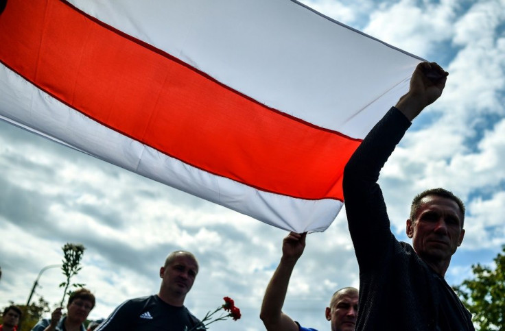 Belarus opposition supporters joined a funeral ceremony for a protester who died on on Monday