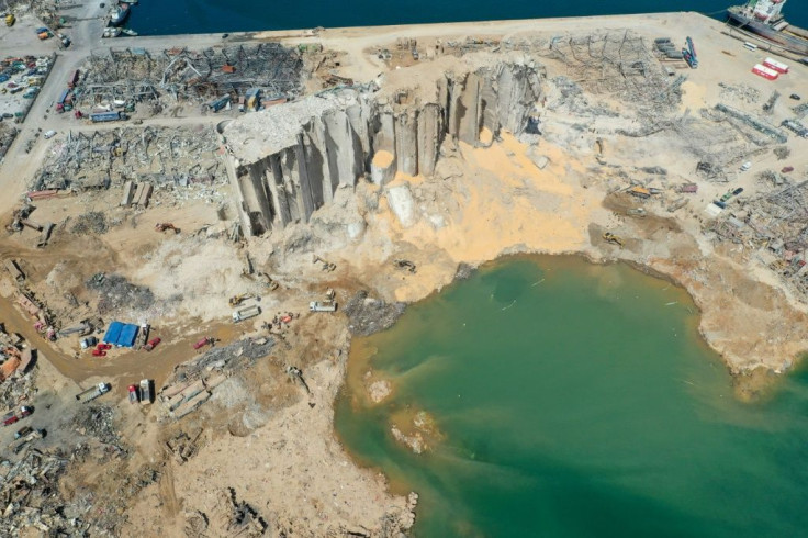 An aerial view of the port of Beirut, the damaged grain silo and the crater caused by the colossal explosion of a huge pile of ammonium nitrate that had languished for years in a port warehouse